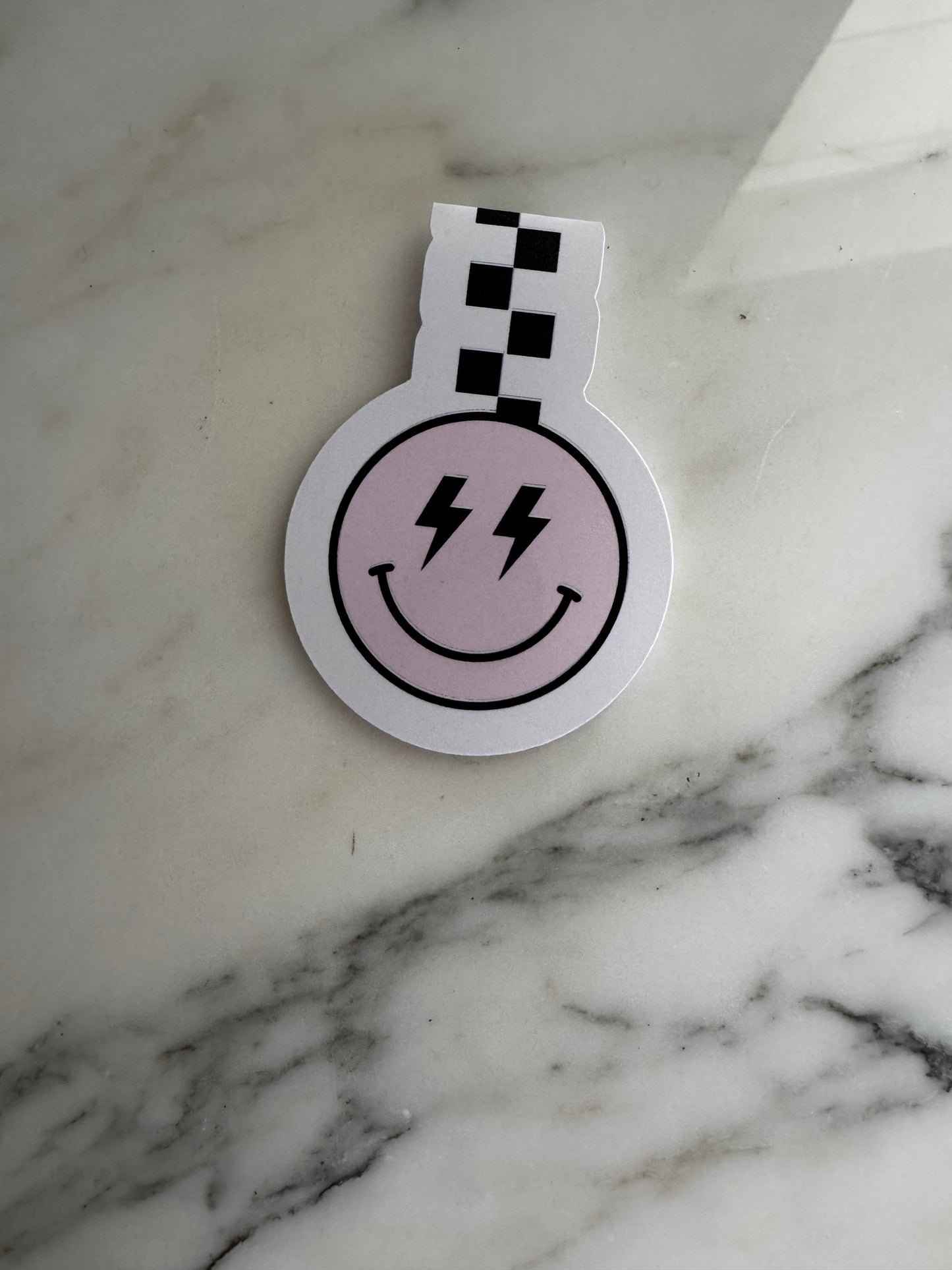 Magnetic checkered happy face bookmark